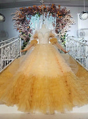 Yellow Ball Gown Tulle Long Sleeve Open Back Wedding Dress With Beading